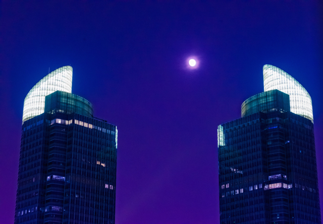 Moon placed between twin towers